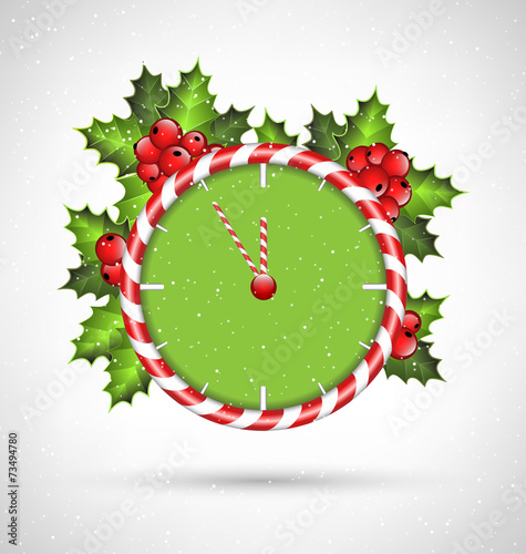 Candy cane clock with holly sprigs in snowfall on grayscale back