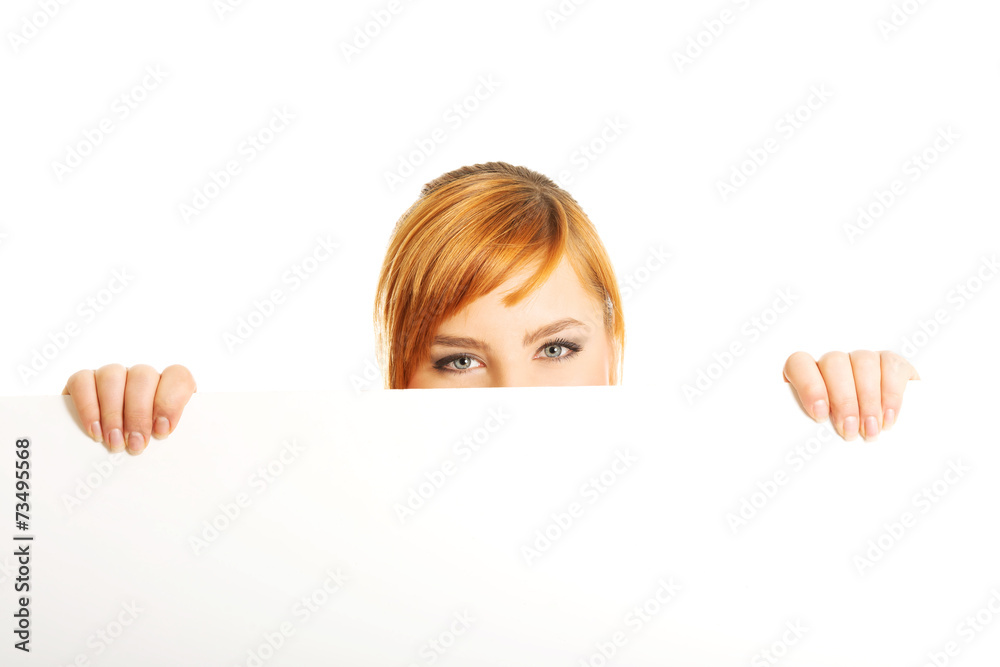 Large woman holding a white board Large woman holding a white board