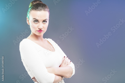 Nice Portrait of Serious Sensual Brunette Woman Over Gray Backgr photo