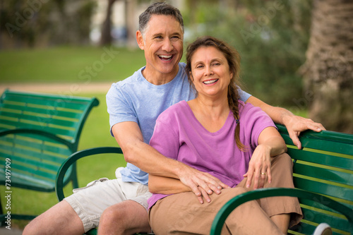 Elder couple relaxing at the park