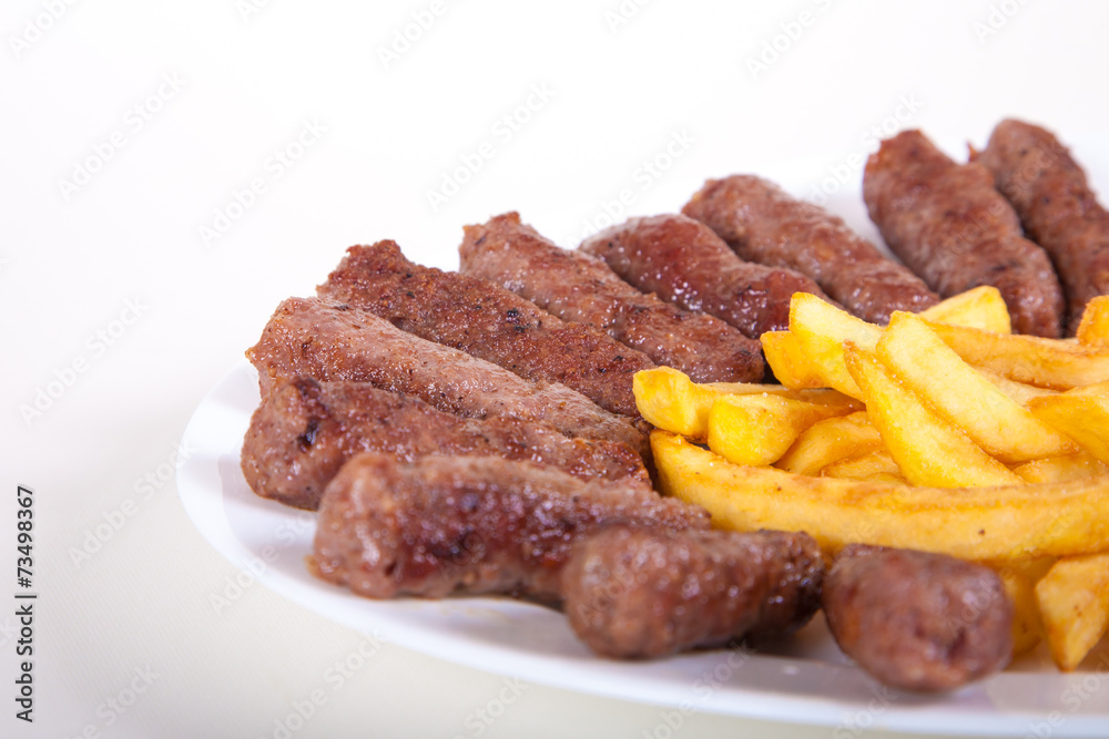 Grilled dish of minced meat cevapcici Grilled dish of minced meat cevapcici