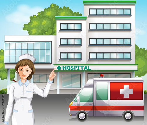 A nurse in front of the hospital