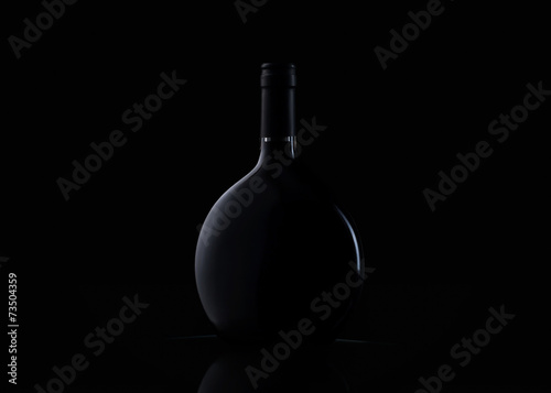 Bottle of wine on black background