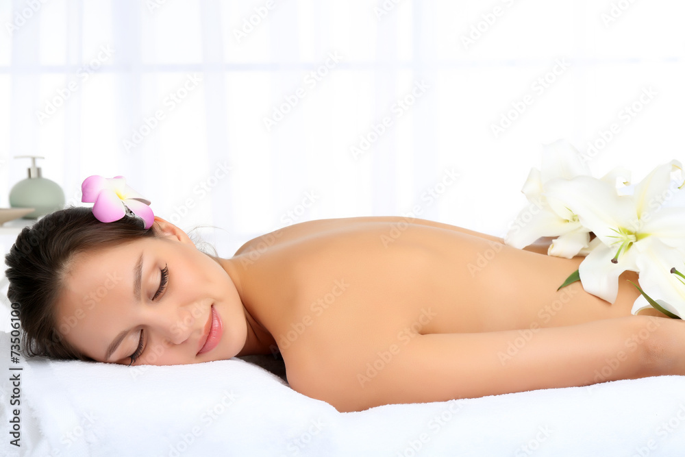 Beautiful young woman in spa salon on light background Beautiful young woman in spa salon on light background