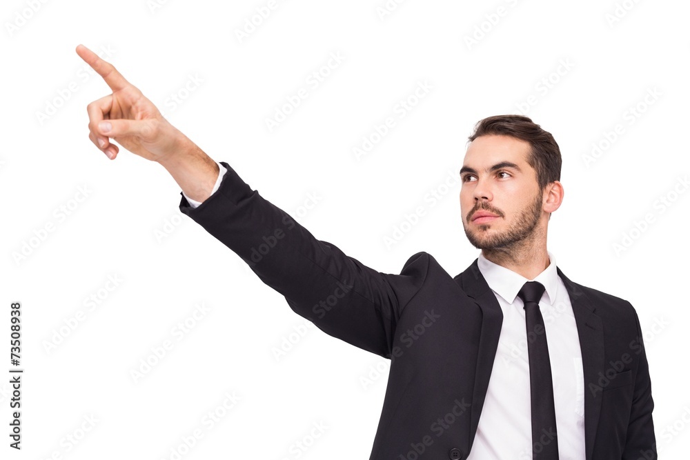 Thoughtful businessman pointing his finger Thoughtful businessman pointing his finger
