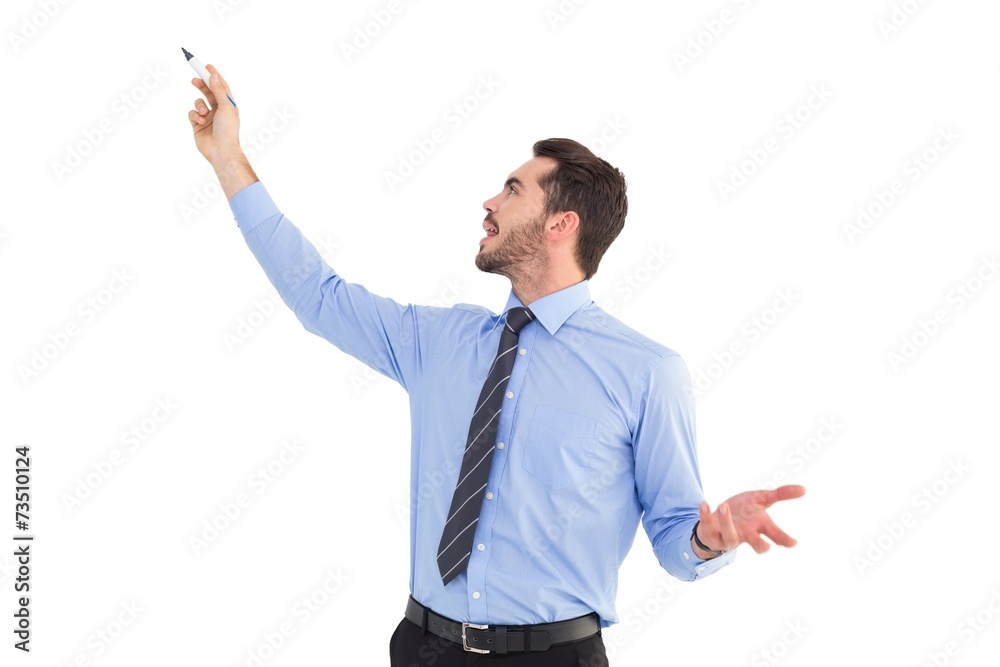 Happy businessman pointing something with marker Happy businessman pointing something with marker