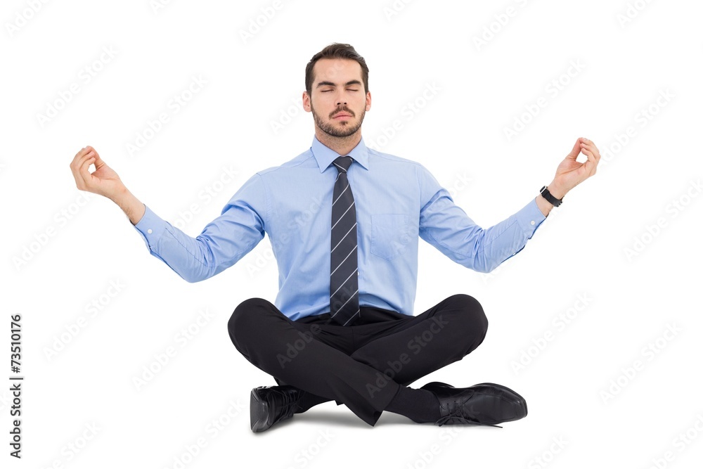 Calm businessman sitting in lotus pose Calm businessman sitting in lotus pose