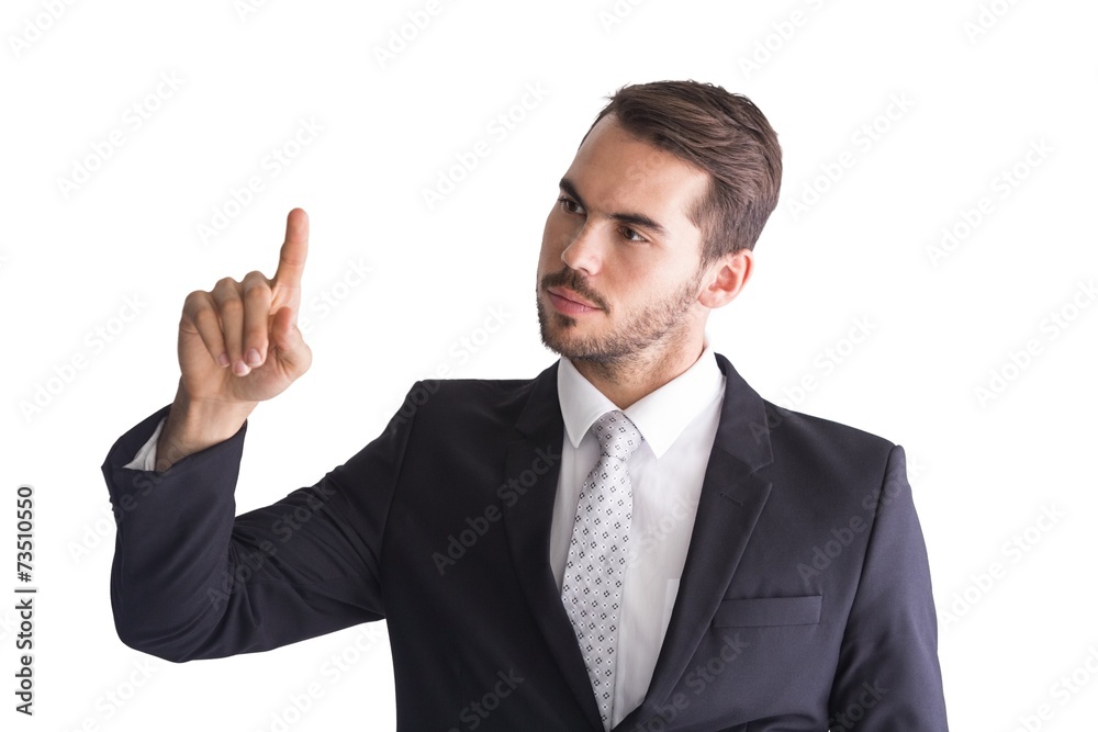 Thoughtful businessman pointing something with his finger Thoughtful businessman pointing something with his finger