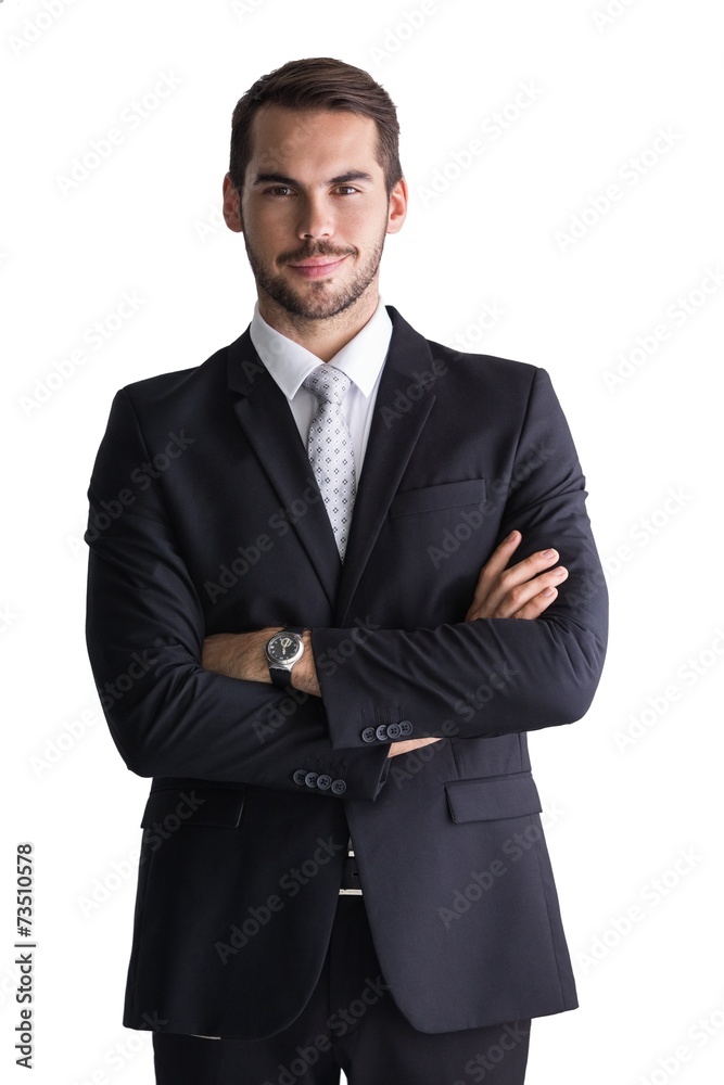 Smiling businessman posing with arms crossed Smiling businessman posing with arms crossed