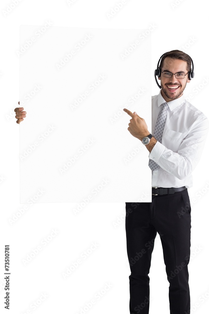 Businessman with headphone pointing sign to camera Businessman with headphone pointing sign to camera