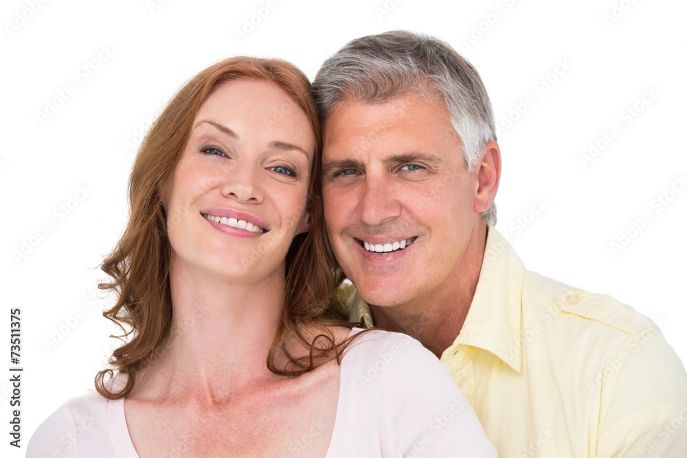 Casual couple hugging and smiling Casual couple hugging and smiling