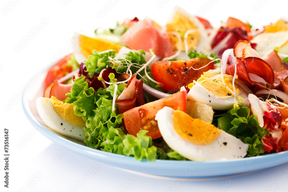 Boiled eggs with smoked ham and vegetables Boiled eggs with smoked ham and vegetables