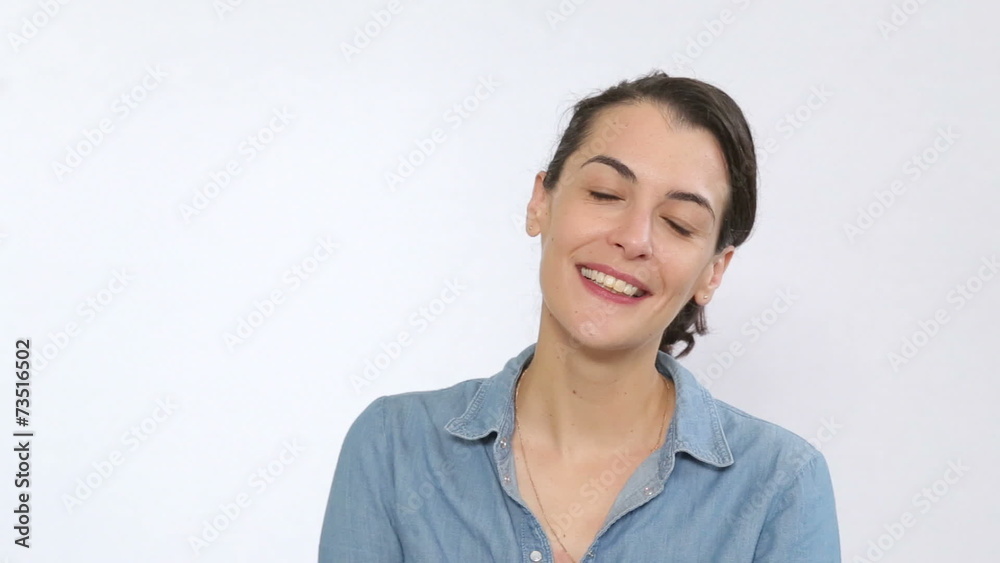 Happy natural model smiling and giggling Happy natural model smiling and giggling