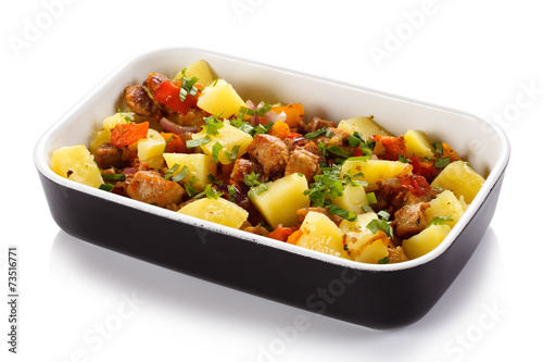 Roast meat with boiled potatoes and vegetables
