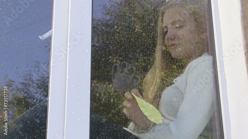 Sad tearful teenage girl says goodbye to her mother