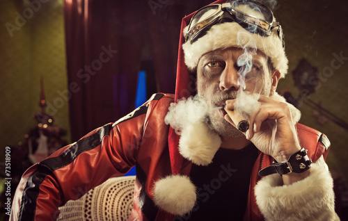 Bad Santa smoking a cigar