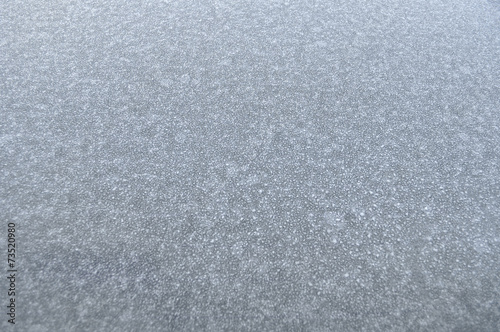 frozen car windshield in winter