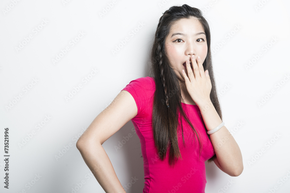 Smiling asian girl with arms crossed Smiling asian girl with arms crossed