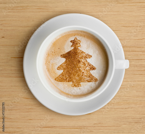 coffee cup with foam and christmas tree shape
