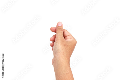Woman hand holding coin isolates on white background