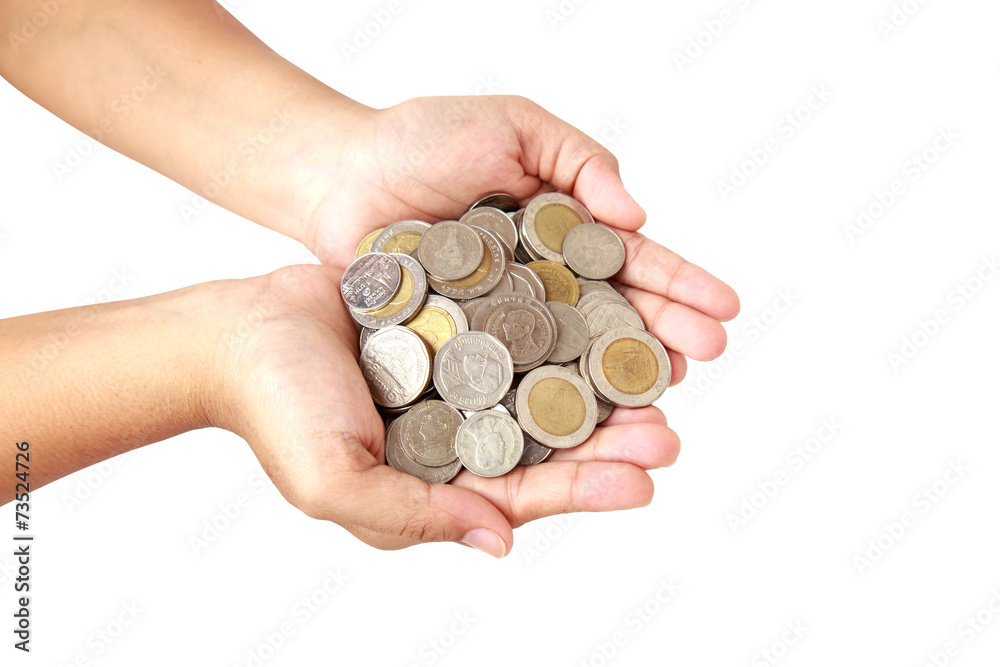 Woman hand holding coin isolates on white background Woman hand holding coin isolates on white background