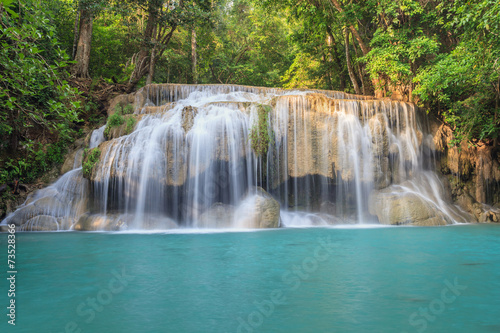 tropical waterfall in Deep forest © Noppasinw
