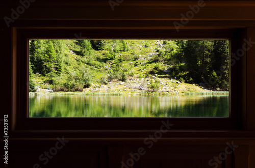 Wood windows with a lake view