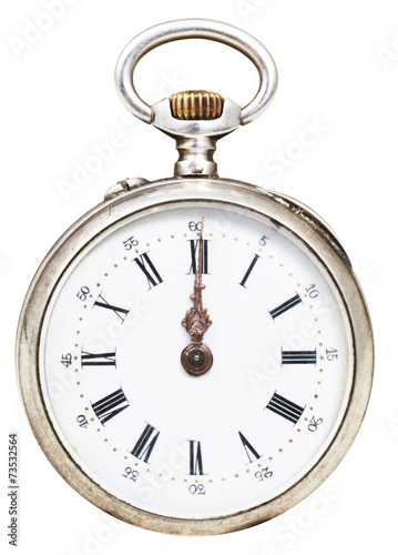 twelve o'clock on the dial of retro pocket watch