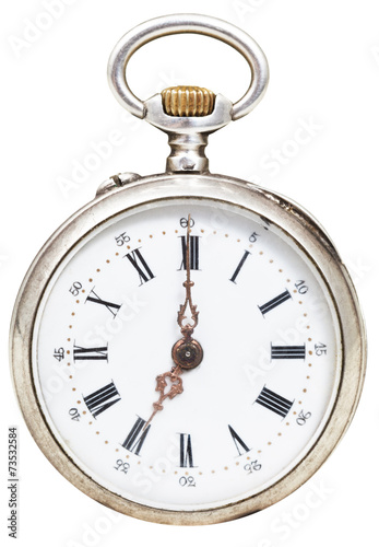 seven o'clock on the dial of retro pocket watch