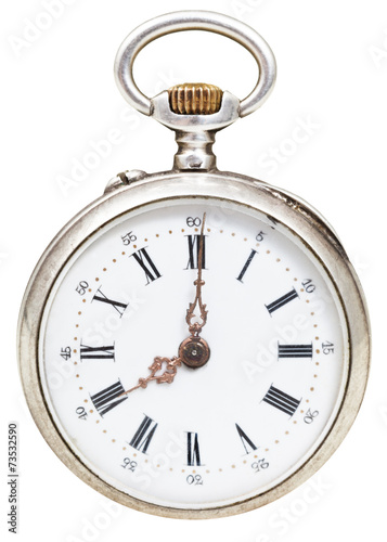 eight o'clock on the dial of retro pocket watch