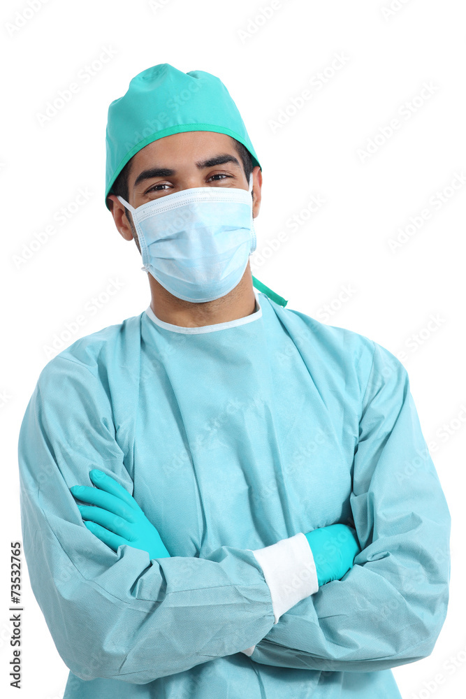 Surgeon doctor posing standing with folded arms Surgeon doctor posing standing with folded arms