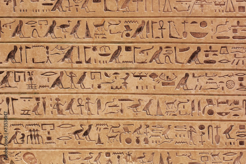 Egyptian hieroglyphs stone background