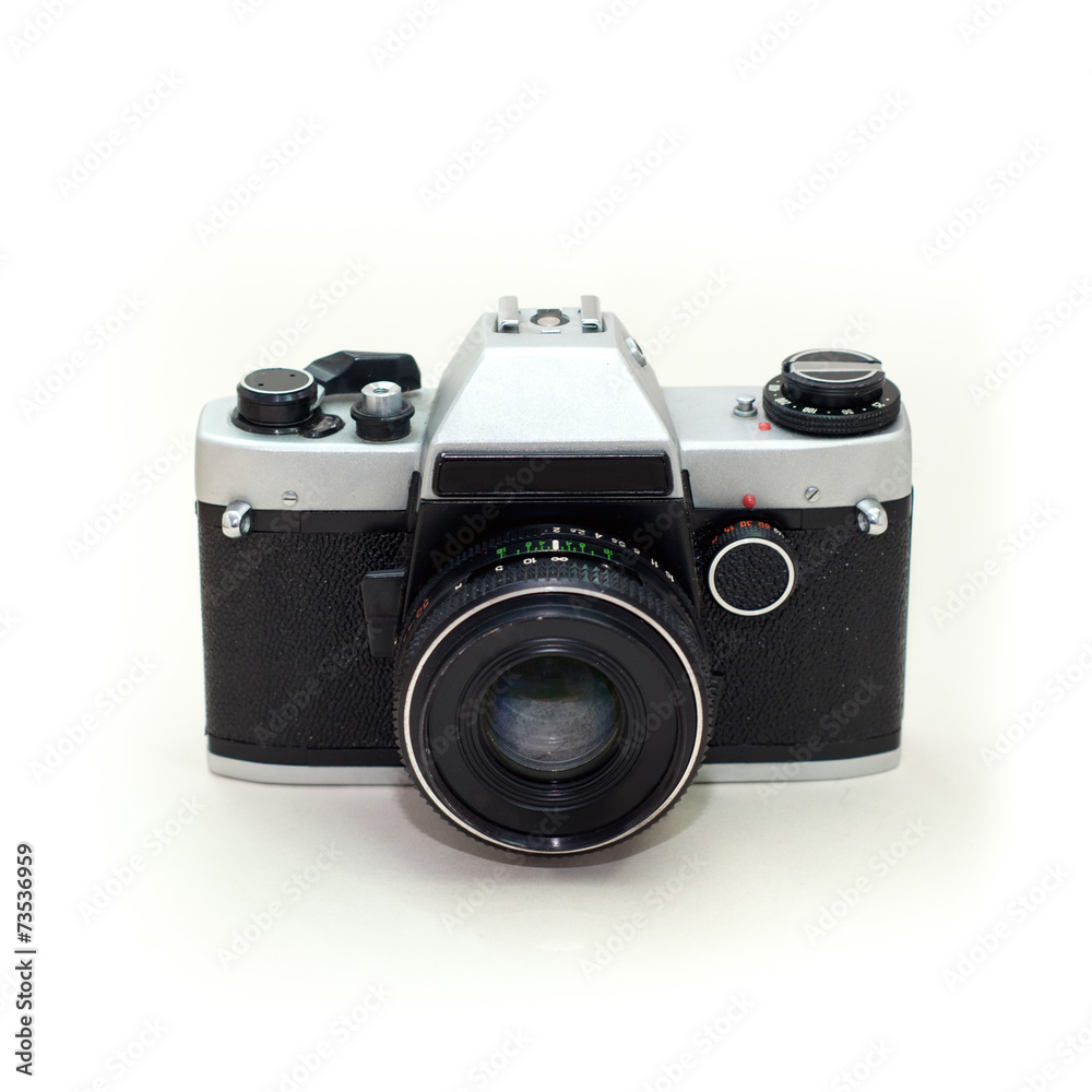 Retro photo camera isolated on a white background