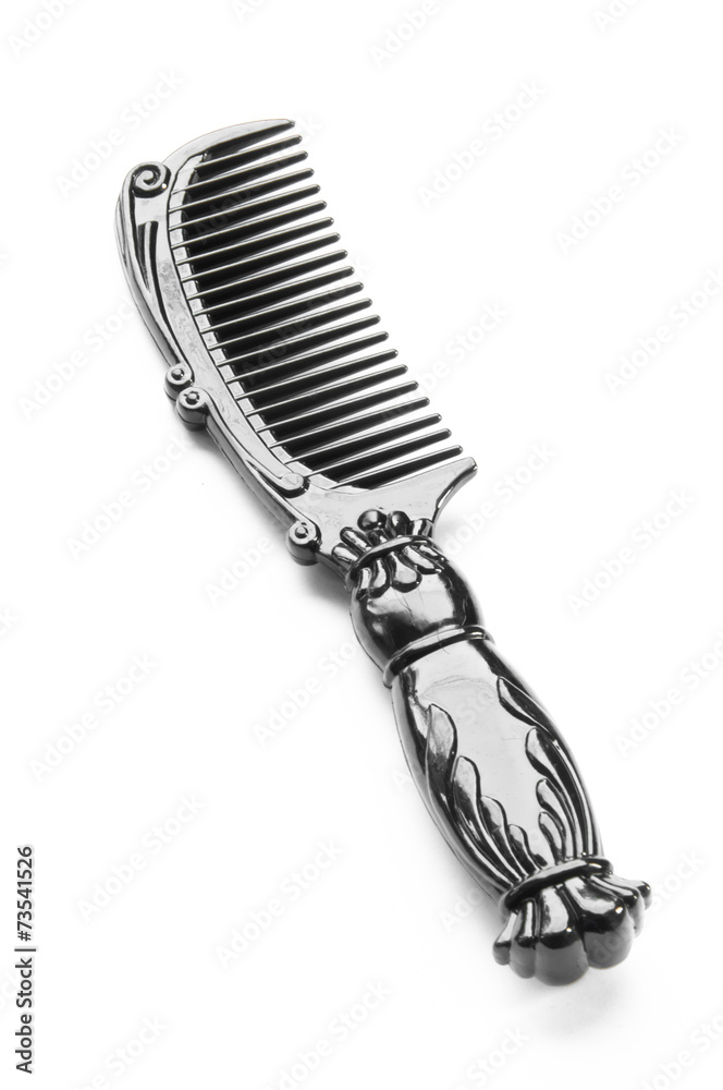 Naklejka premium Black comb isolated on white background, vintage