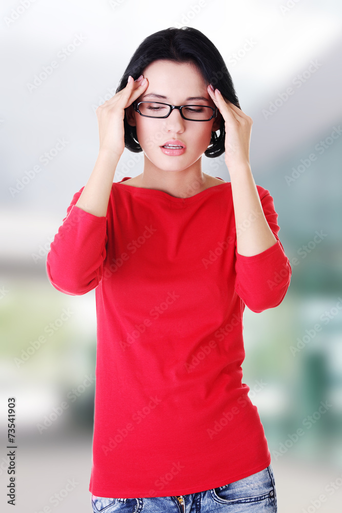 Fototapeta premium Young woman have headache