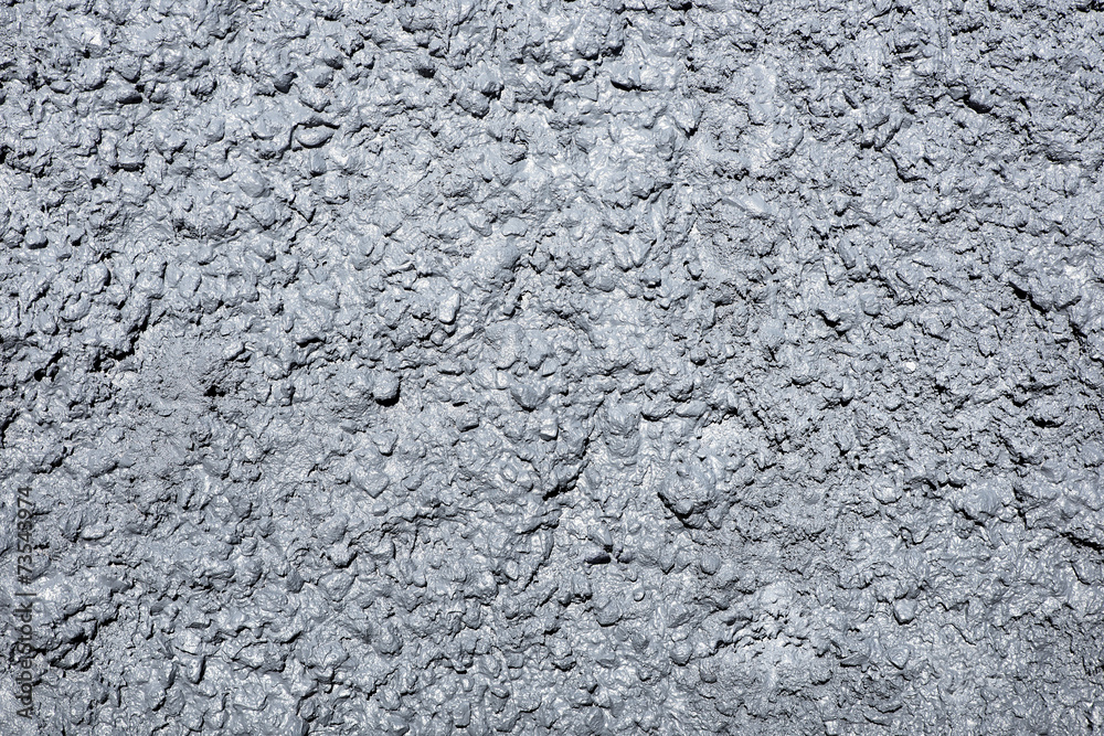 Painted concrete background on coated stone wall Painted concrete background on coated stone wall
