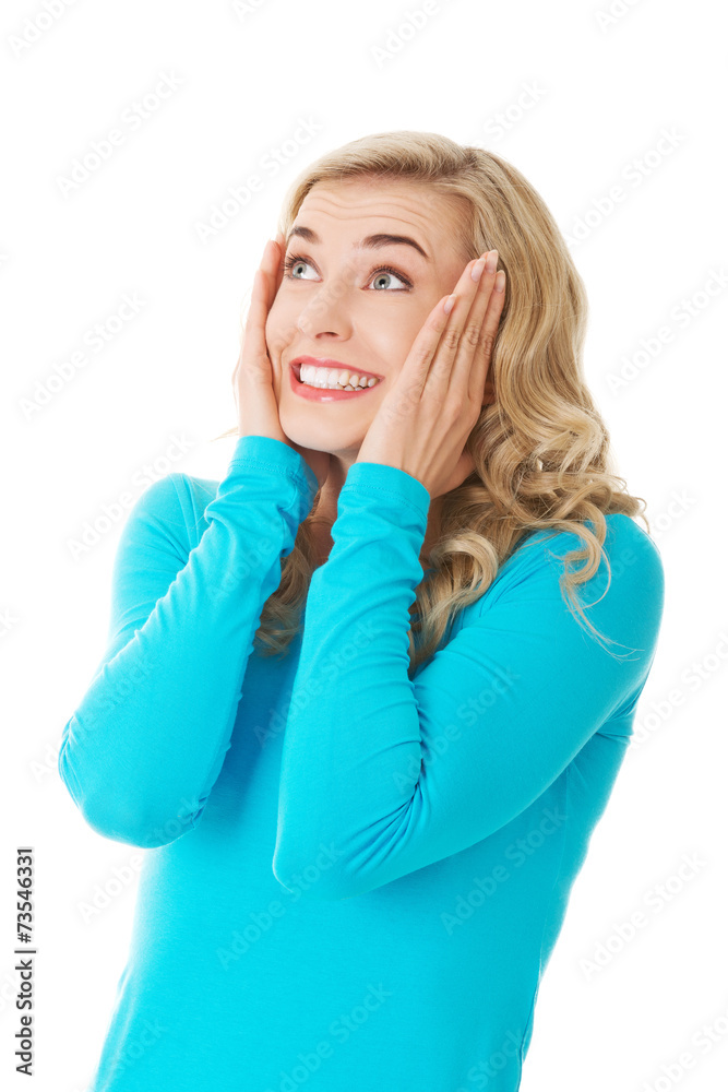 Surprised woman with hands on head Surprised woman with hands on head