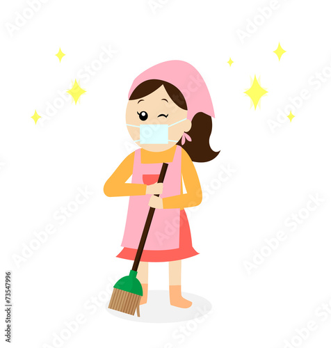 A happy woman wearing a mask and an apron sweeping the floor