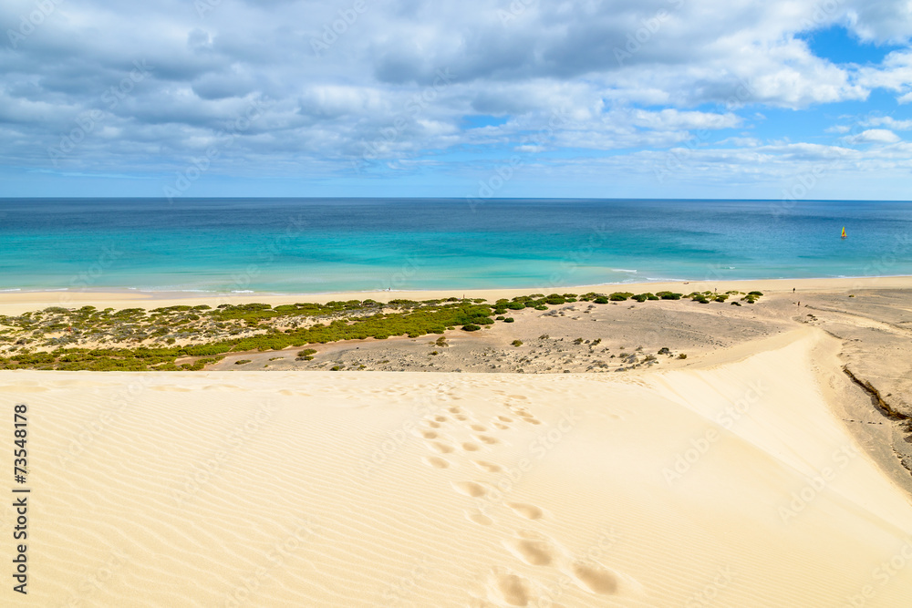 Footprints on sand dune on Sotavento beach, Fuerteventura island