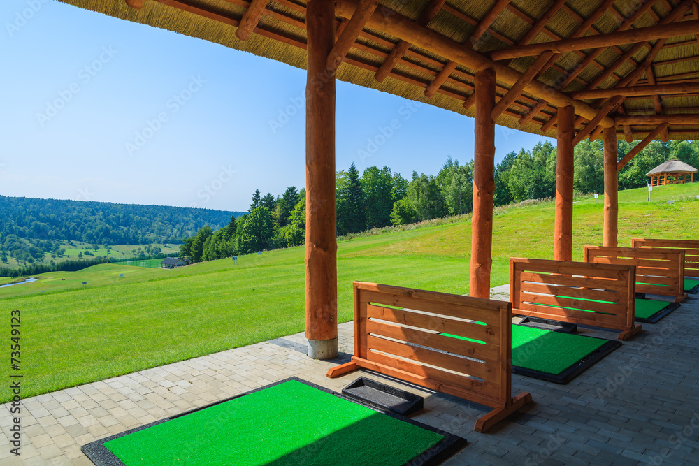 Golf course on sunny summer day in Arlamow village, Poland