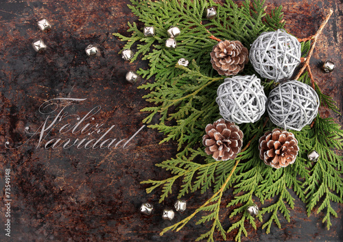 Christmas rustic concept with Merry Christmas in Spanish