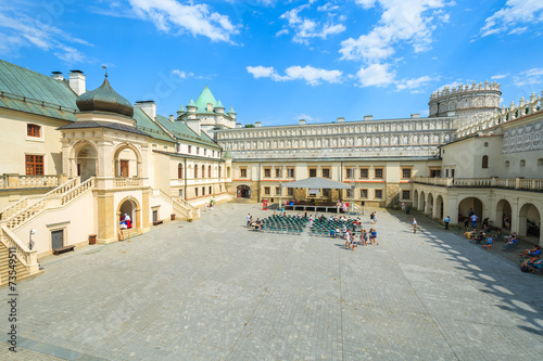 Courtyard of Krasiczyn castle on sunny summer day, Poland