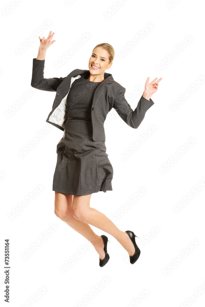 Cheerful jumping businesswoman Cheerful jumping businesswoman