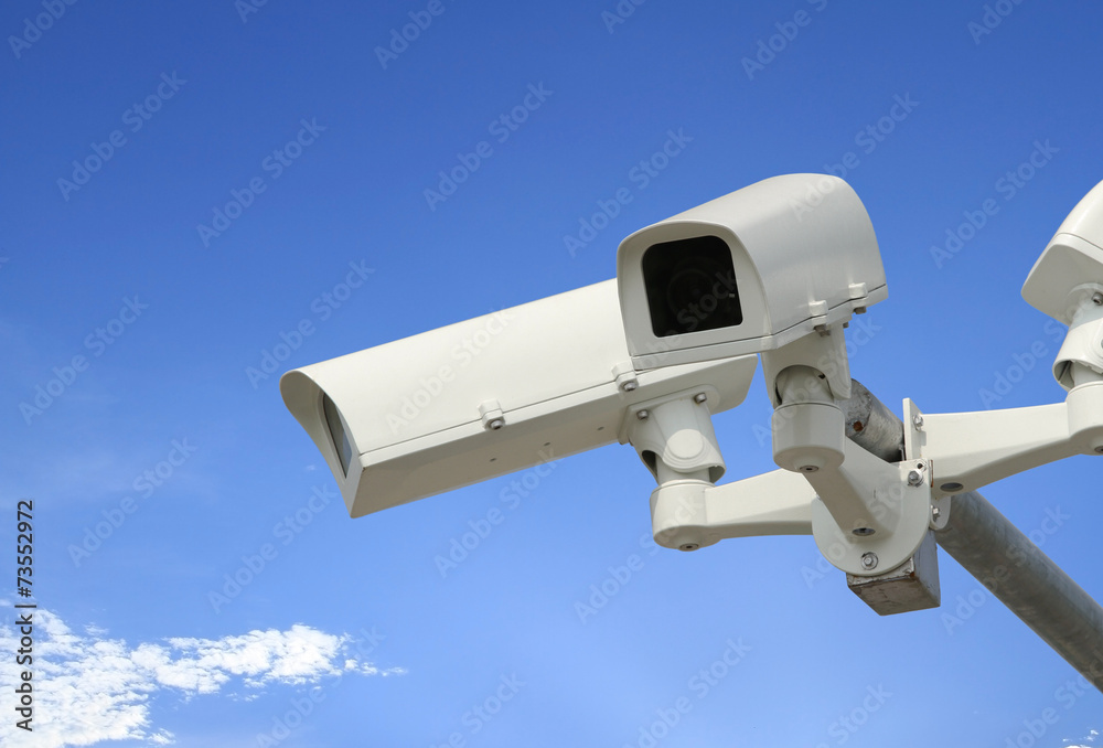 Security camera with blue sky