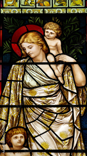 Woman withe children in stained glass