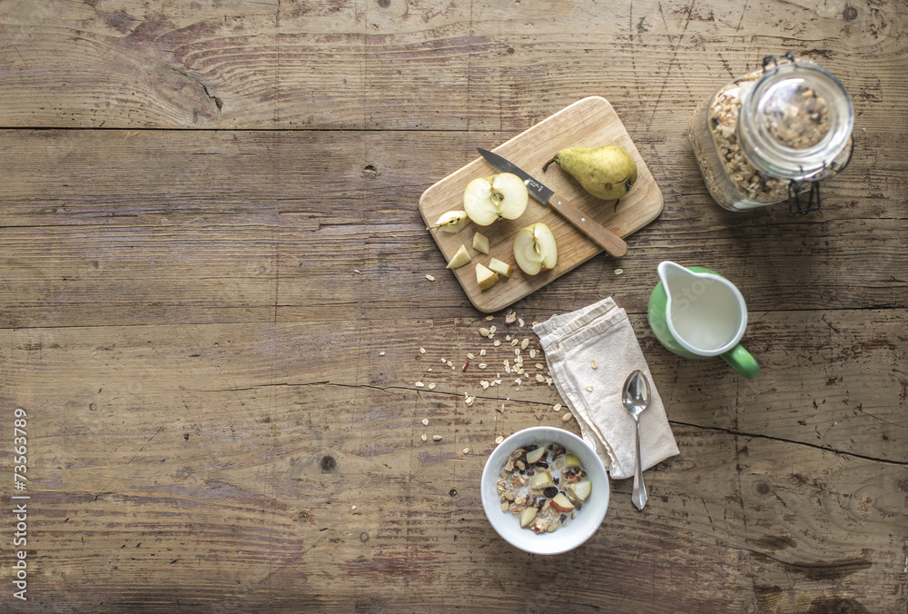 Breakfast Time - Muesli on a wooden Table Breakfast Time - Muesli on a wooden Table