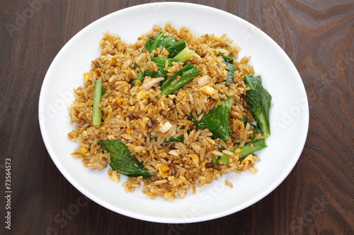 Chinese fried rice with pork and green leek vegetable