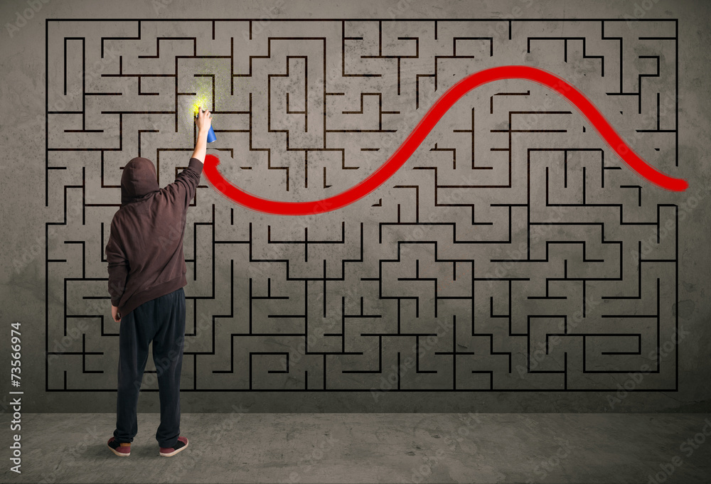 Young urban painter drawing