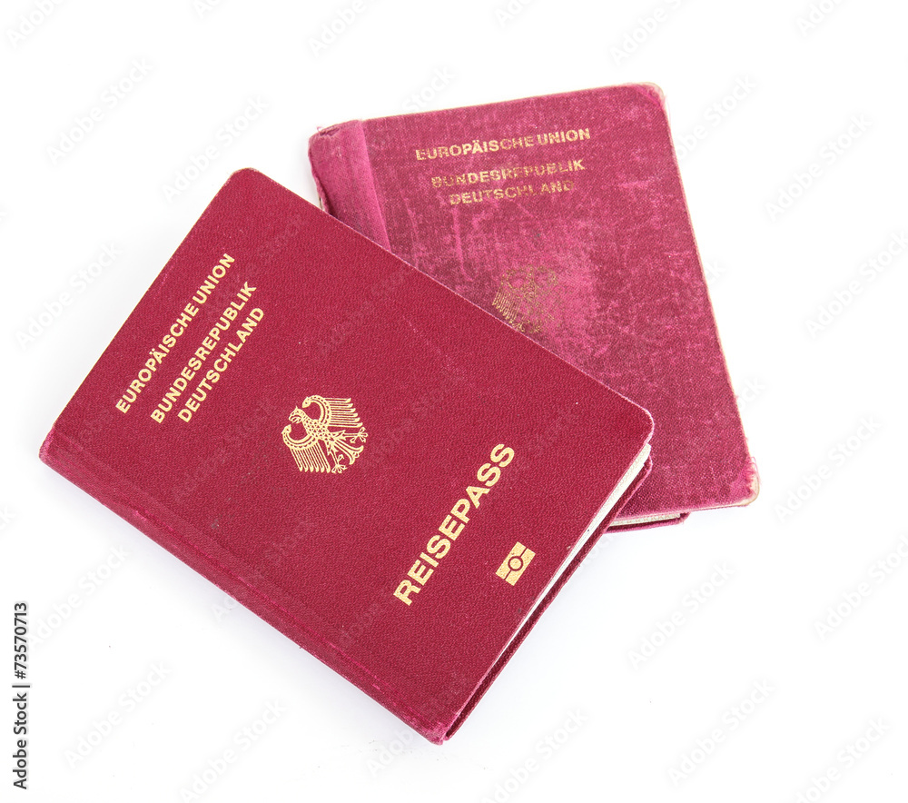 Germany passports and visas isolated on white background Germany passports and visas isolated on white background