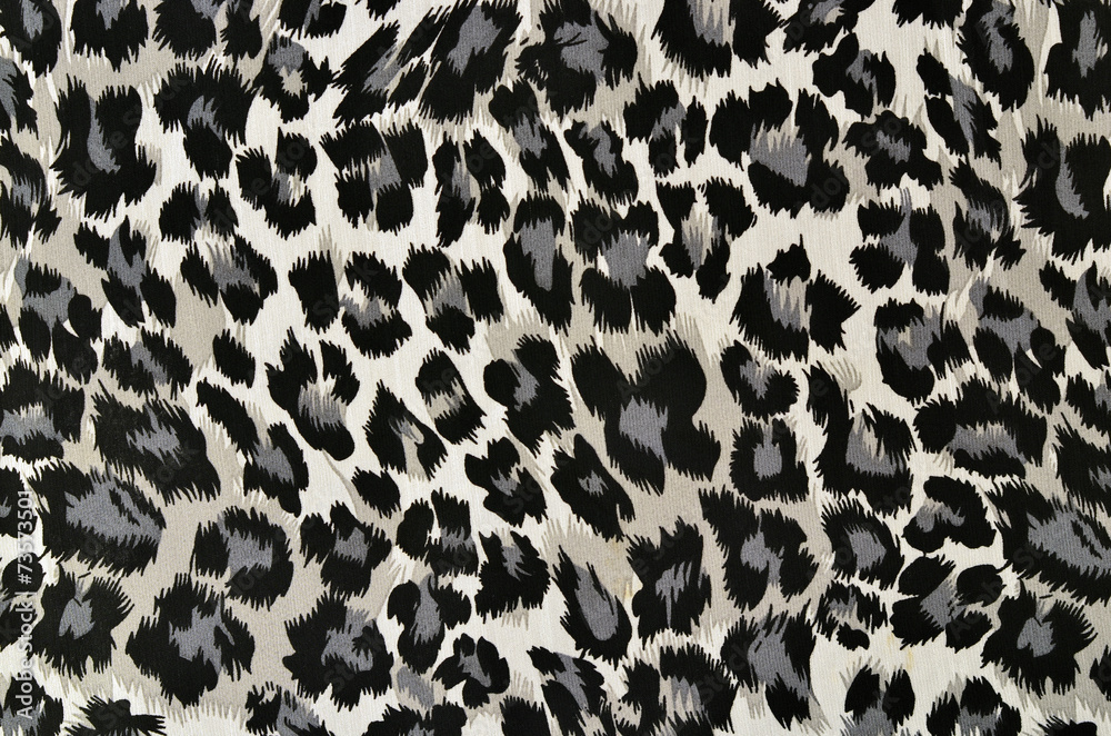 Grey and black leopard pattern.Spotted animal print background. Stock Photo
